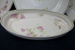 CMC-  MAUREIL CHAPEAU & CHARLES-  PURPLE VIOLETS-  CANOE SHAPE SERVING DISH   ..... https://www.jaapiesfinechinastore.com