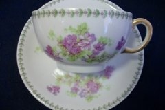 CMC-  MAUREIL CHAPEAU & CHARLES-  PURPLE VIOLETS-  CUP & SAUCER    ..... http://jaapiesfinechinastore.com