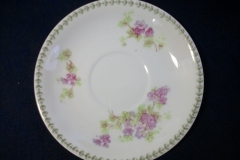 CMC-  MAUREIL CHAPEAU & CHARLES-  PURPLE VIOLETS-  CUP & SAUCER    ..... https://www.jaapiesfinechinastore.com