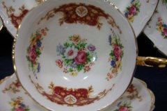 REGENCY FLORAL SPRAYS, MAROON & TAN CARTOUCHE-  CUP & SAUCER   .....   http://jaapiesfinechinastore.com